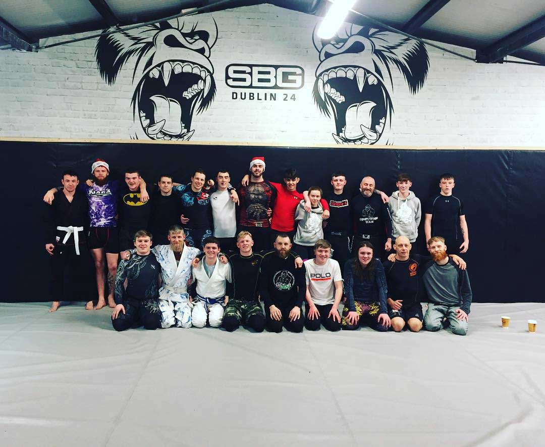 Members and coaches on the mats of SBG Dublin24 on Christmas day
